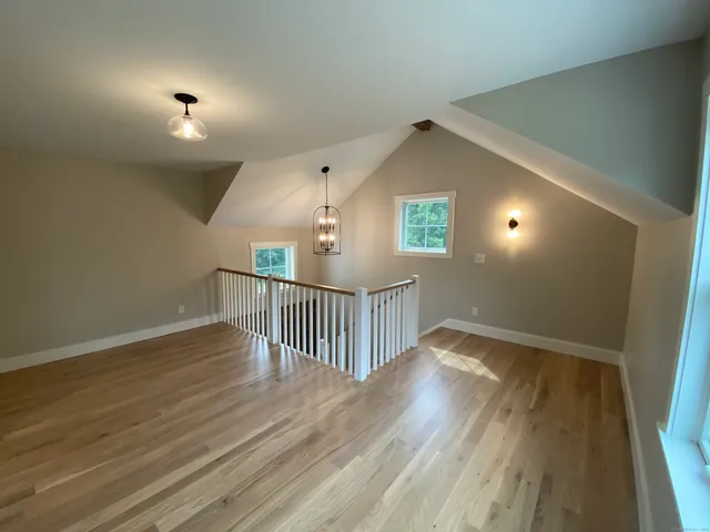 a view of entryway with wooden floor