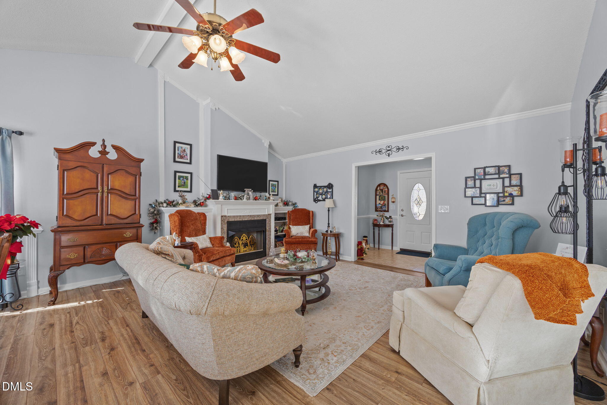 6194 Friedens Grove Road Gibsonville, NC 27249 - Photo 9 of 23 a living room with furniture and a flat screen tv