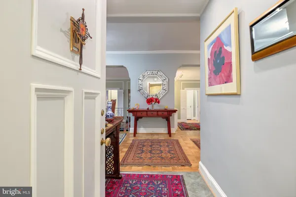 a living room with furniture and a rug