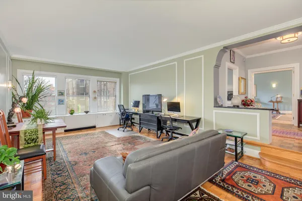 a living room with furniture and a table