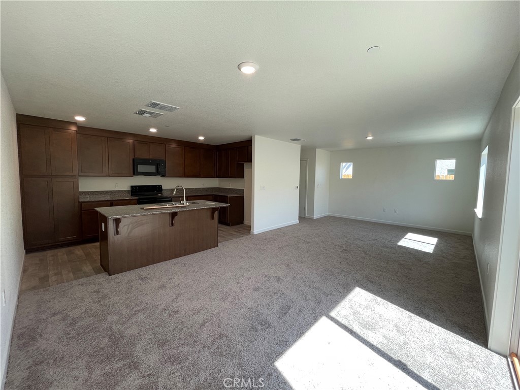 707 Stone Ridge Avenue Merced, CA 95341 - Photo 1 of 3 Photos are of a similar home. Actual home, features, and finishes may vary.