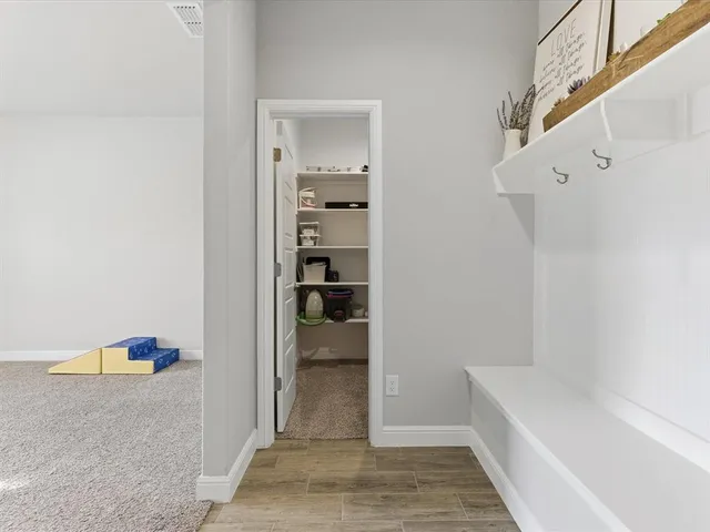 a bathroom with a tub and shower