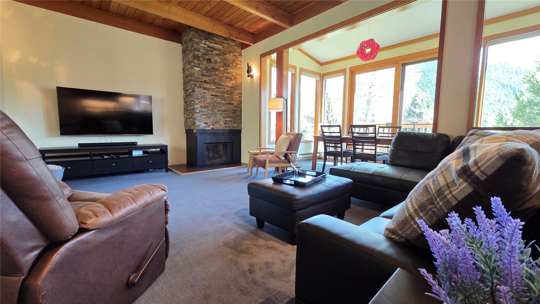 620 Tennis Club Road, Unit 1337 Keystone, CO 80435 - Photo 9 of 48 a living room with furniture and a flat screen tv