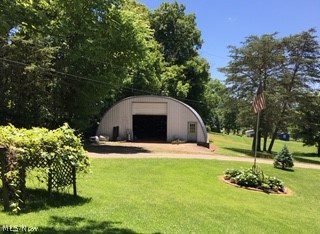361 Anderson Road Davisville, WV 26142 - Photo 3 of 20 Quonset building 40 x 40. About 15 feet tall he said. Does
have garage door and opener as well.