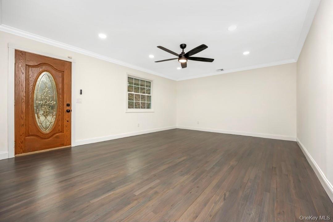 59 Nelson Road Selden, NY 11784 - Photo 11 of 38 Foyer entrance with dark wood-type flooring, recessed lighting, ornamental molding, and ceiling fan