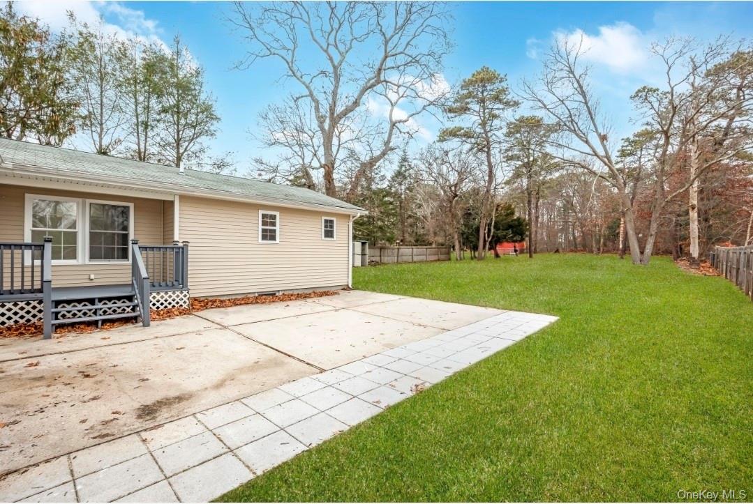 59 Nelson Road Selden, NY 11784 - Photo 4 of 38 View of yard featuring a patio area and a deck