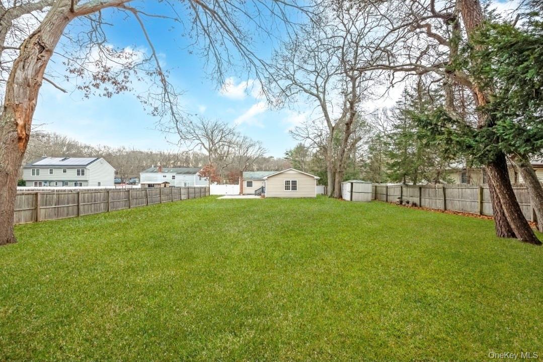 59 Nelson Road Selden, NY 11784 - Photo 8 of 38 View of fenced backyard