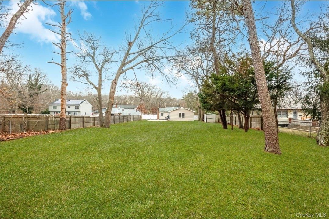 59 Nelson Road Selden, NY 11784 - Photo 9 of 38 View of fenced backyard