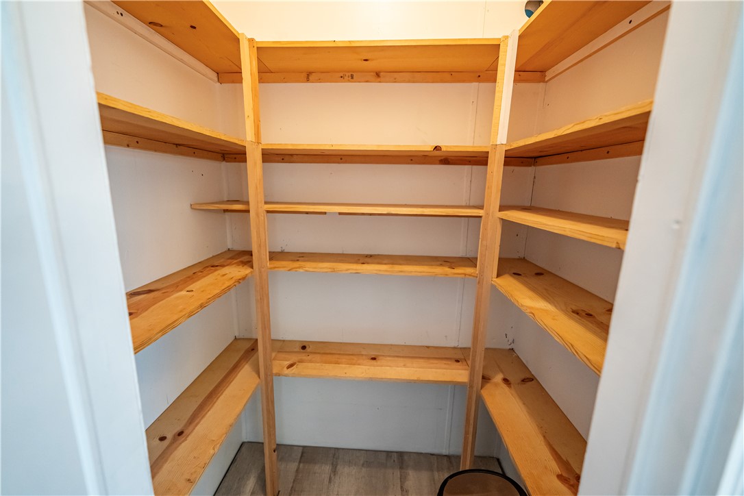 2765 North Silver Springs Road Kingman, AZ 86401 - Photo 50 of 60 a view of walk in closet with empty racks