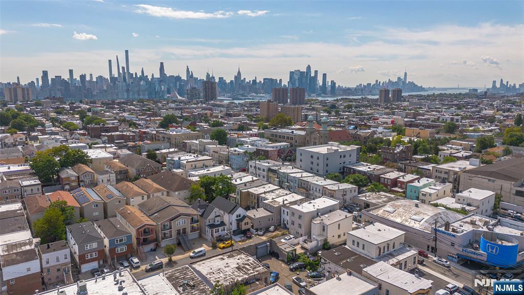 600 67th Street West New York, NJ 07093 - Photo 1 of 12 an aerial view of a city with lots of residential buildings