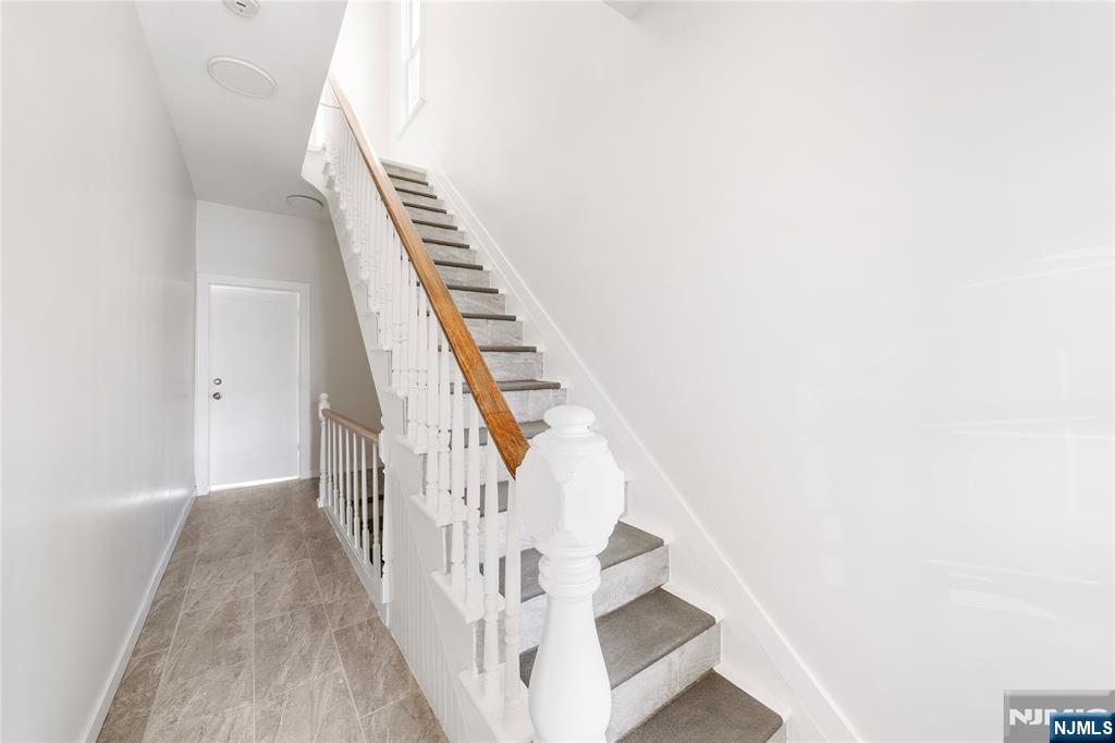 600 67th Street West New York, NJ 07093 - Photo 2 of 12 a view of an entryway with staircase