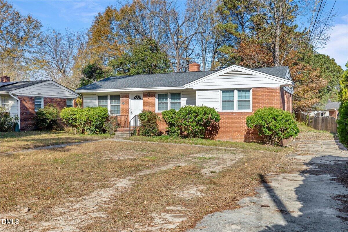 513 Calloway Drive Raleigh, NC 27610 - Photo 2 of 19 front view of a house with a yard