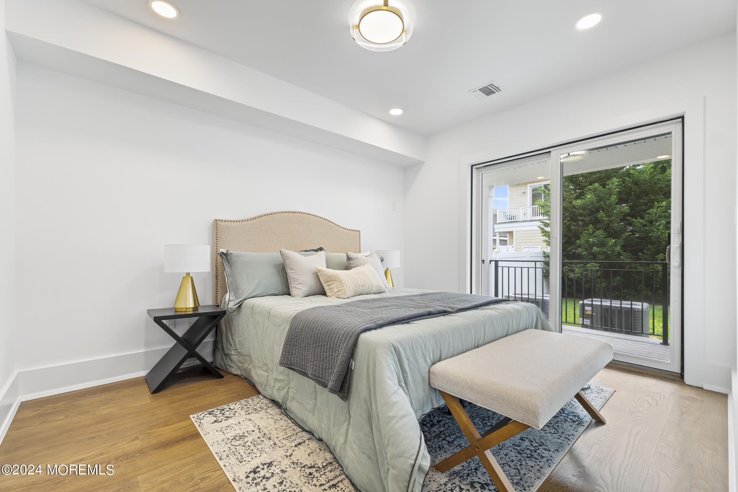 40 Seaview Avenue, Unit B Long Branch, NJ 07740 - Photo 14 of 81 a bedroom with a bed and a window