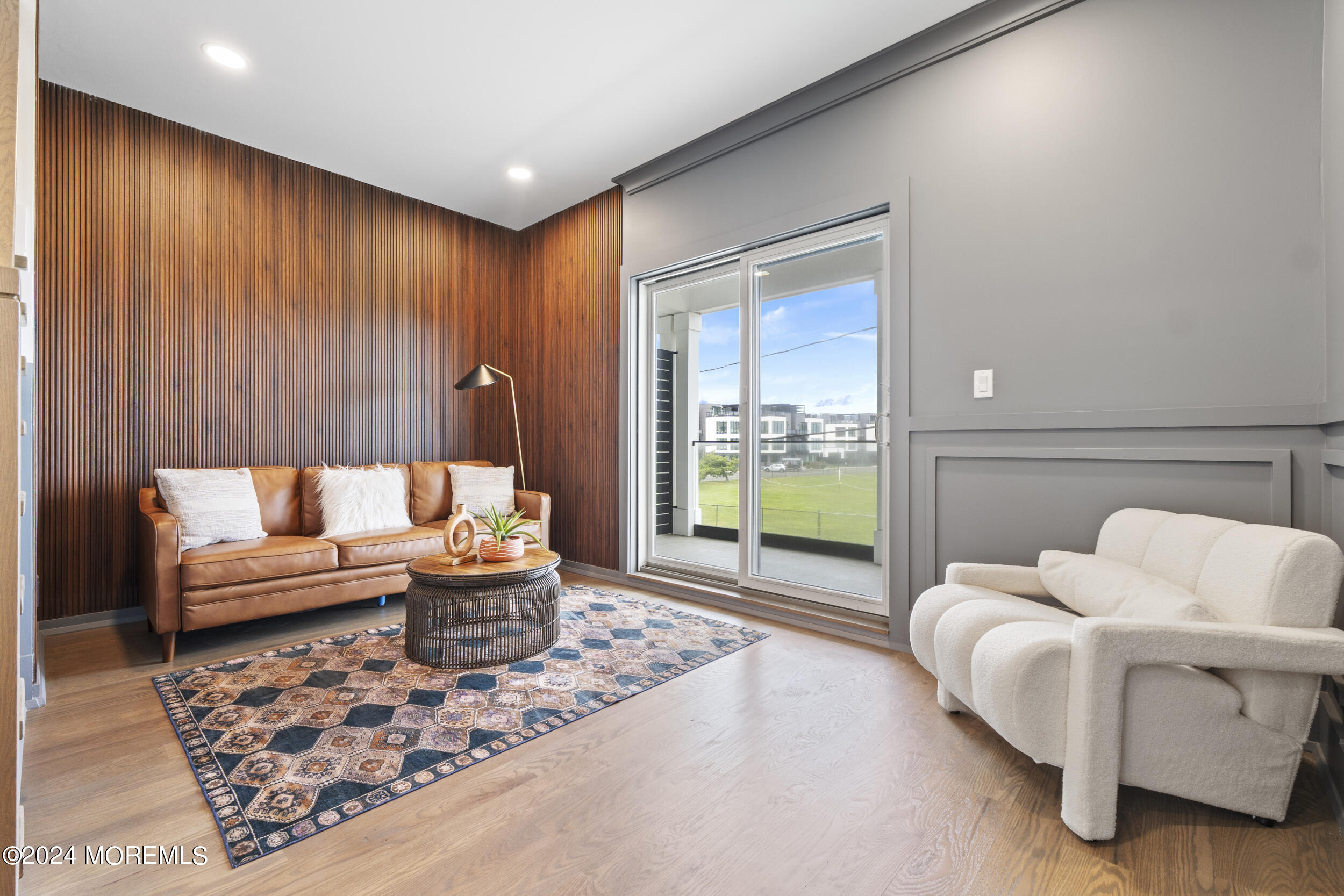 40 Seaview Avenue, Unit B Long Branch, NJ 07740 - Photo 17 of 81 a living room with furniture and a large window