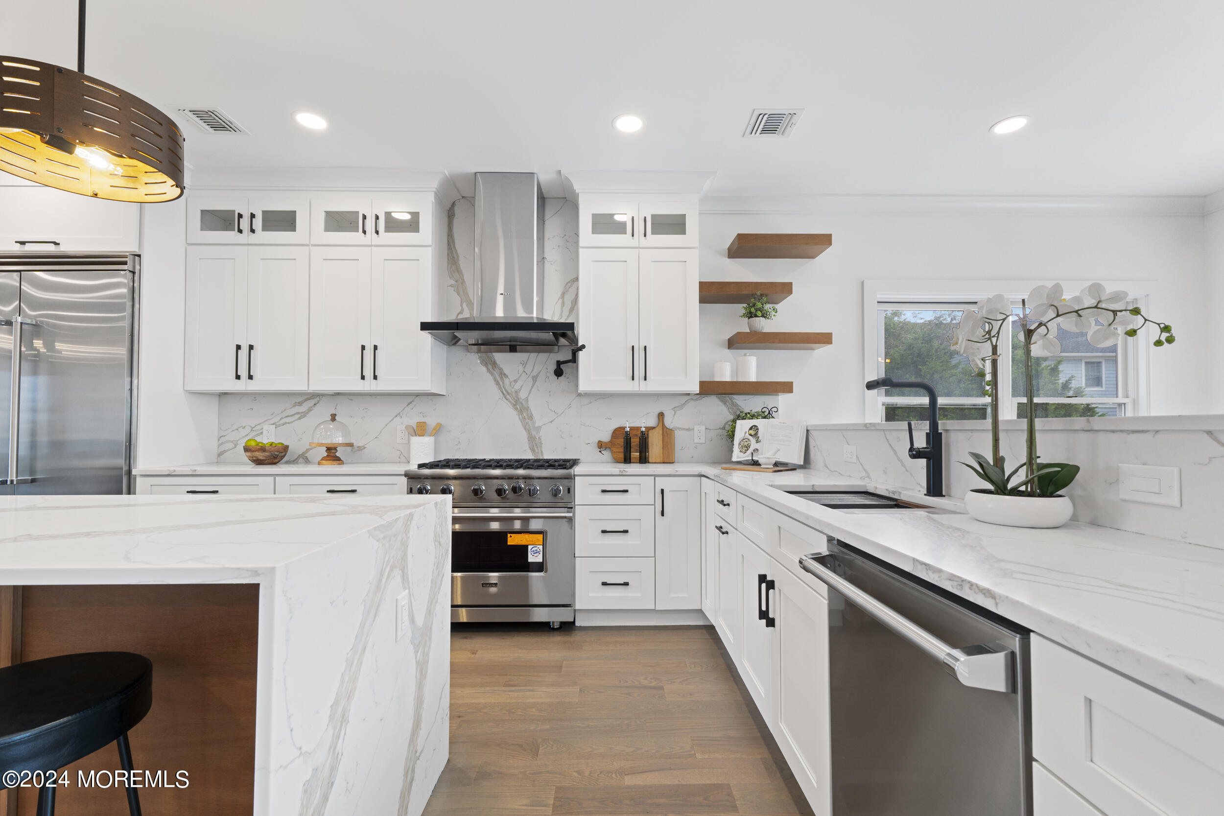 40 Seaview Avenue, Unit B Long Branch, NJ 07740 - Photo 25 of 81 a kitchen with stainless steel appliances granite countertop a sink and cabinets