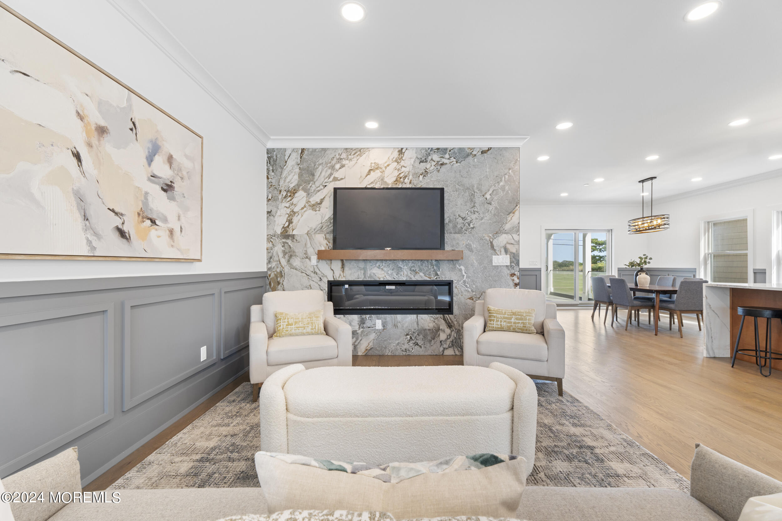 40 Seaview Avenue, Unit B Long Branch, NJ 07740 - Photo 28 of 81 a living room with furniture and a flat screen tv