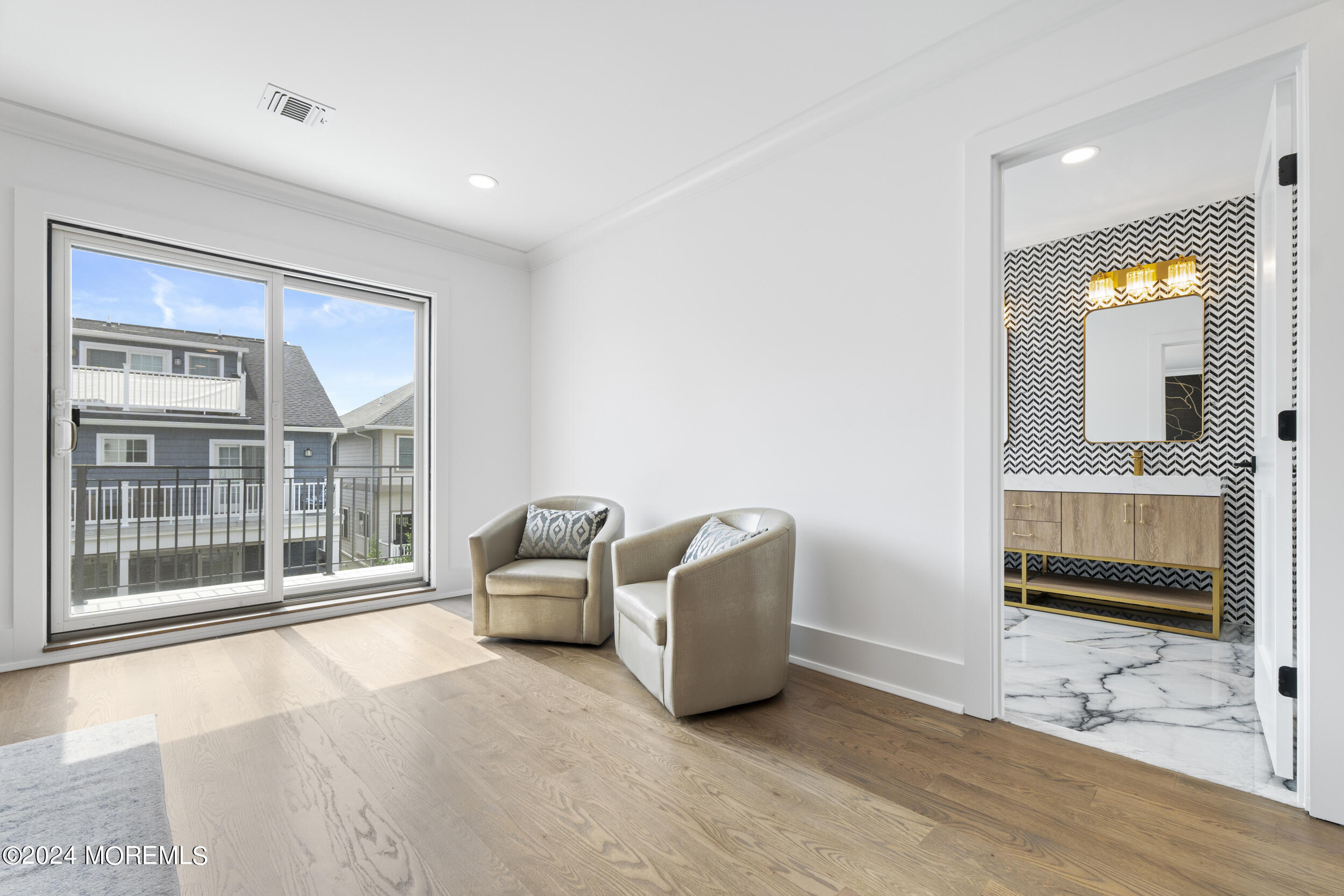 40 Seaview Avenue, Unit B Long Branch, NJ 07740 - Photo 47 of 81 a living room with furniture and a flat screen tv