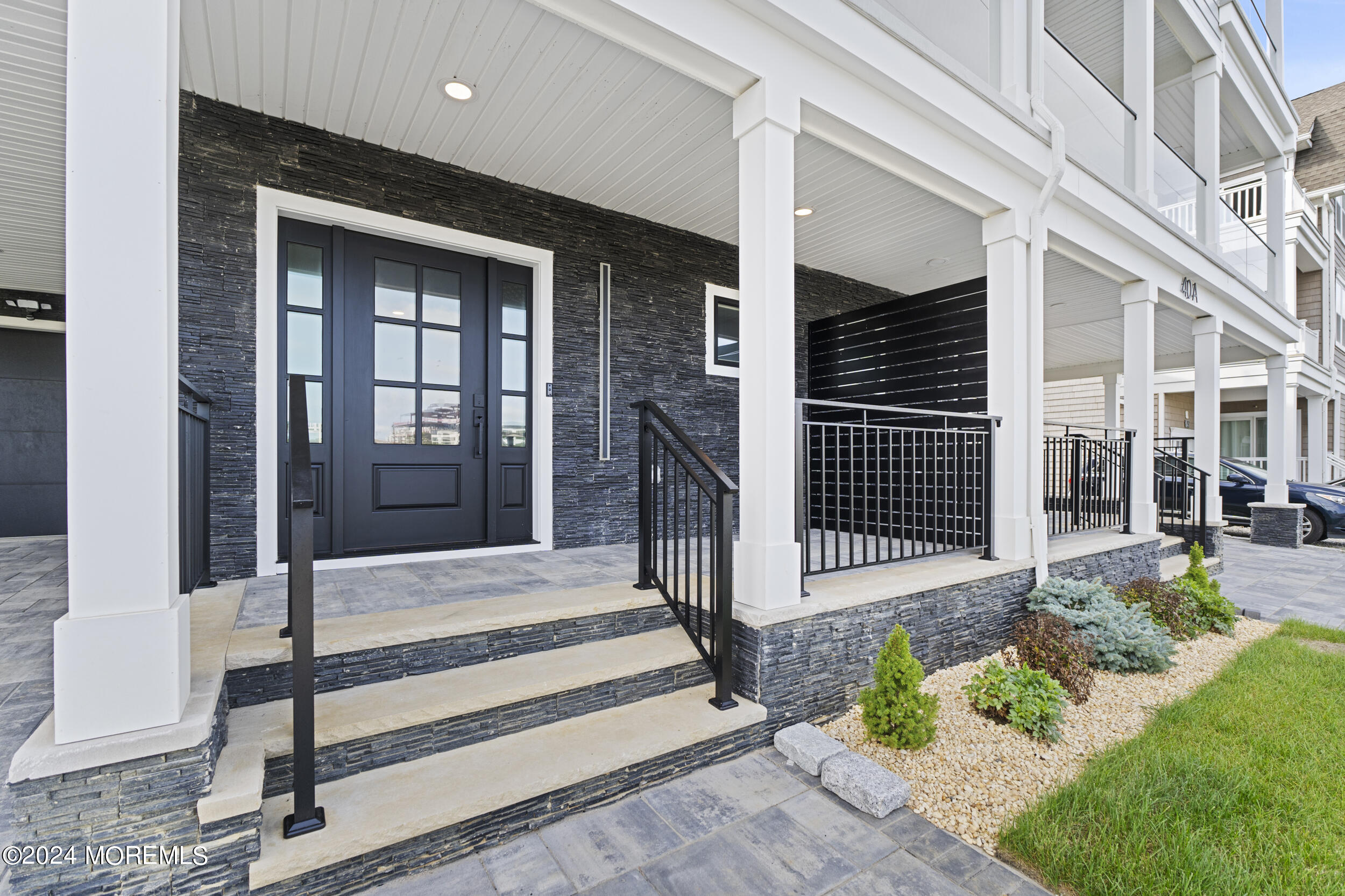 40 Seaview Avenue, Unit B Long Branch, NJ 07740 - Photo 5 of 81 a front view of a house with a garden