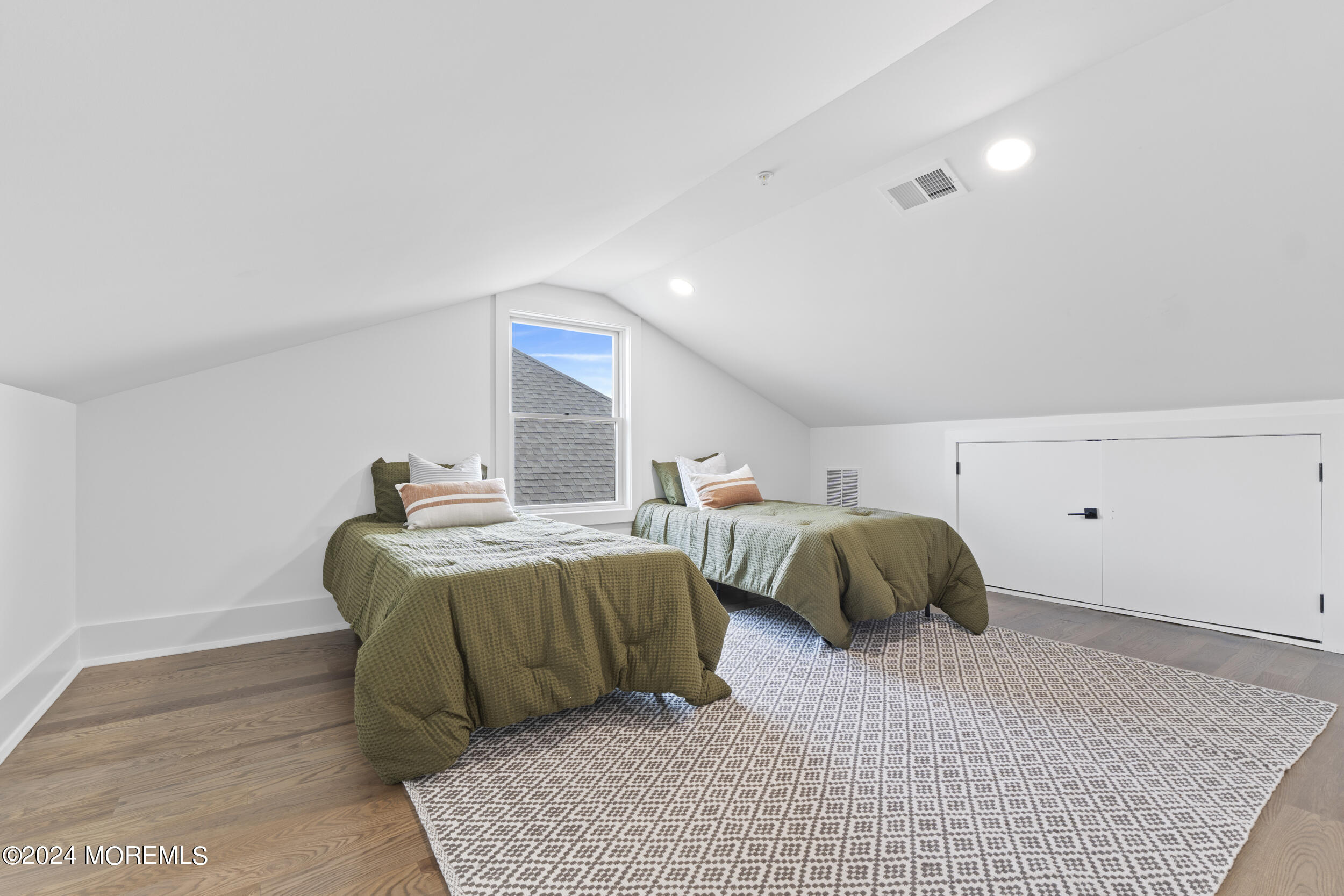 40 Seaview Avenue, Unit B Long Branch, NJ 07740 - Photo 60 of 81 a bedroom with a bed and a night stand
