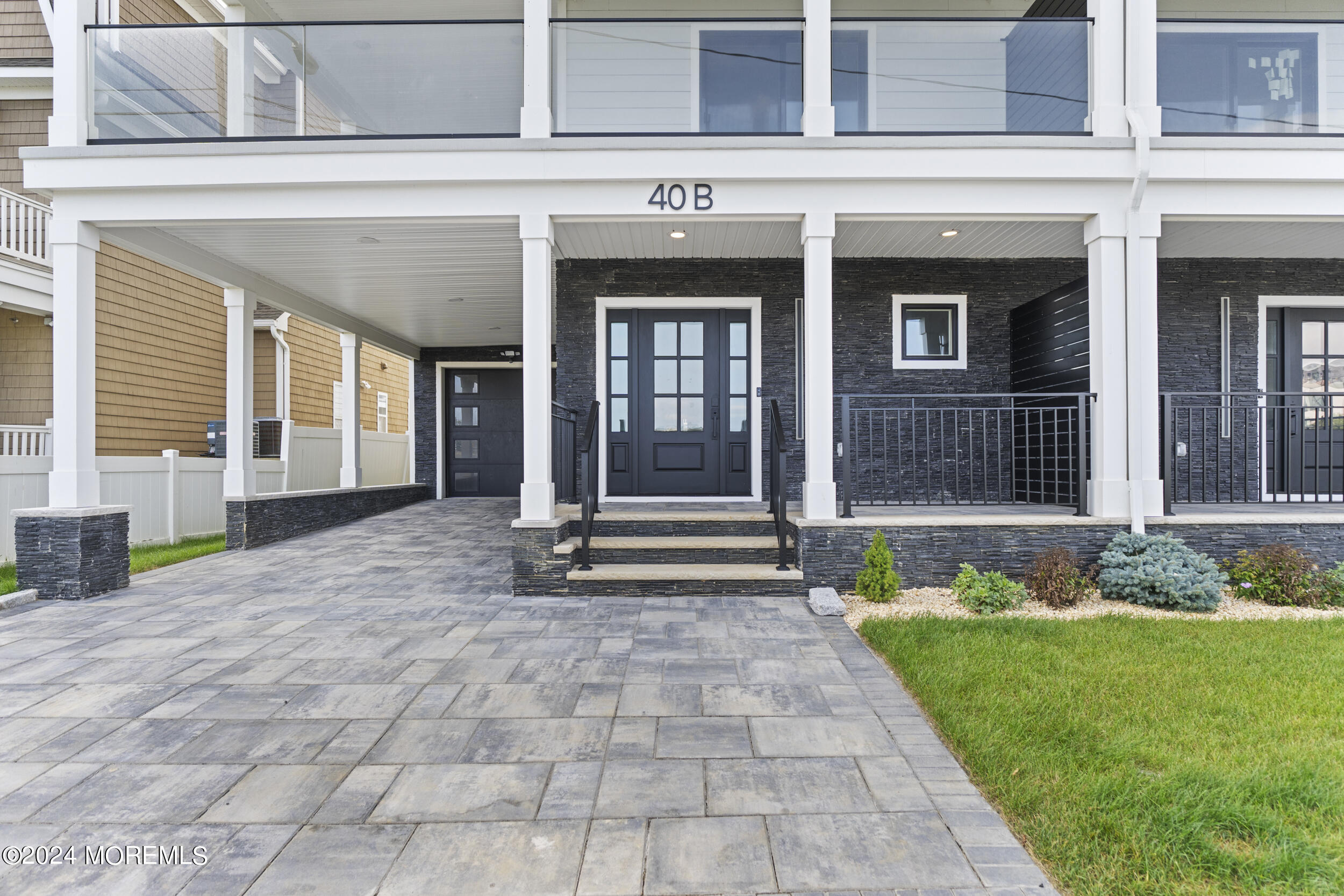 40 Seaview Avenue, Unit B Long Branch, NJ 07740 - Photo 6 of 81 a front view of a house with a yard