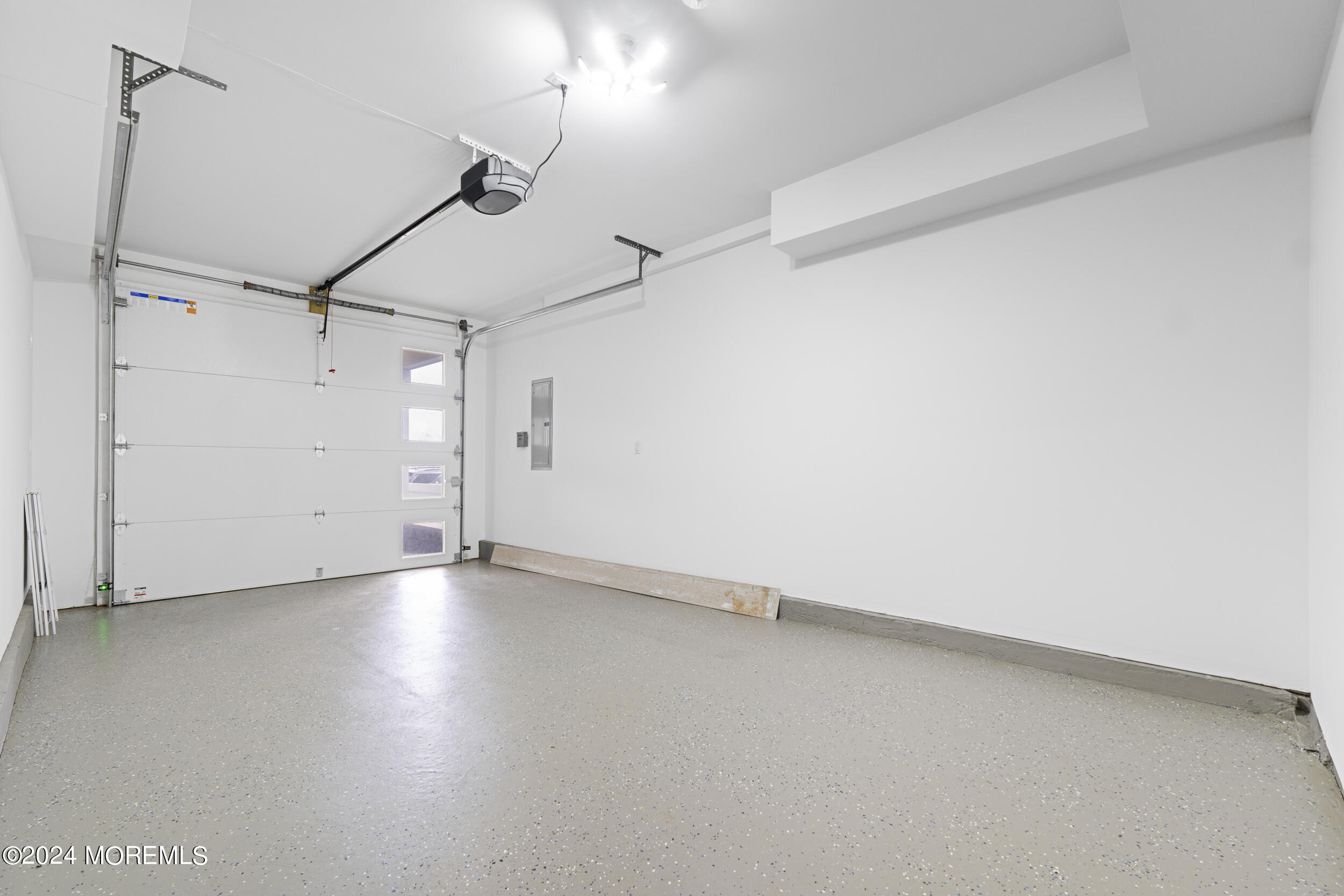 40 Seaview Avenue, Unit B Long Branch, NJ 07740 - Photo 65 of 81 an empty room with a empty space and windows