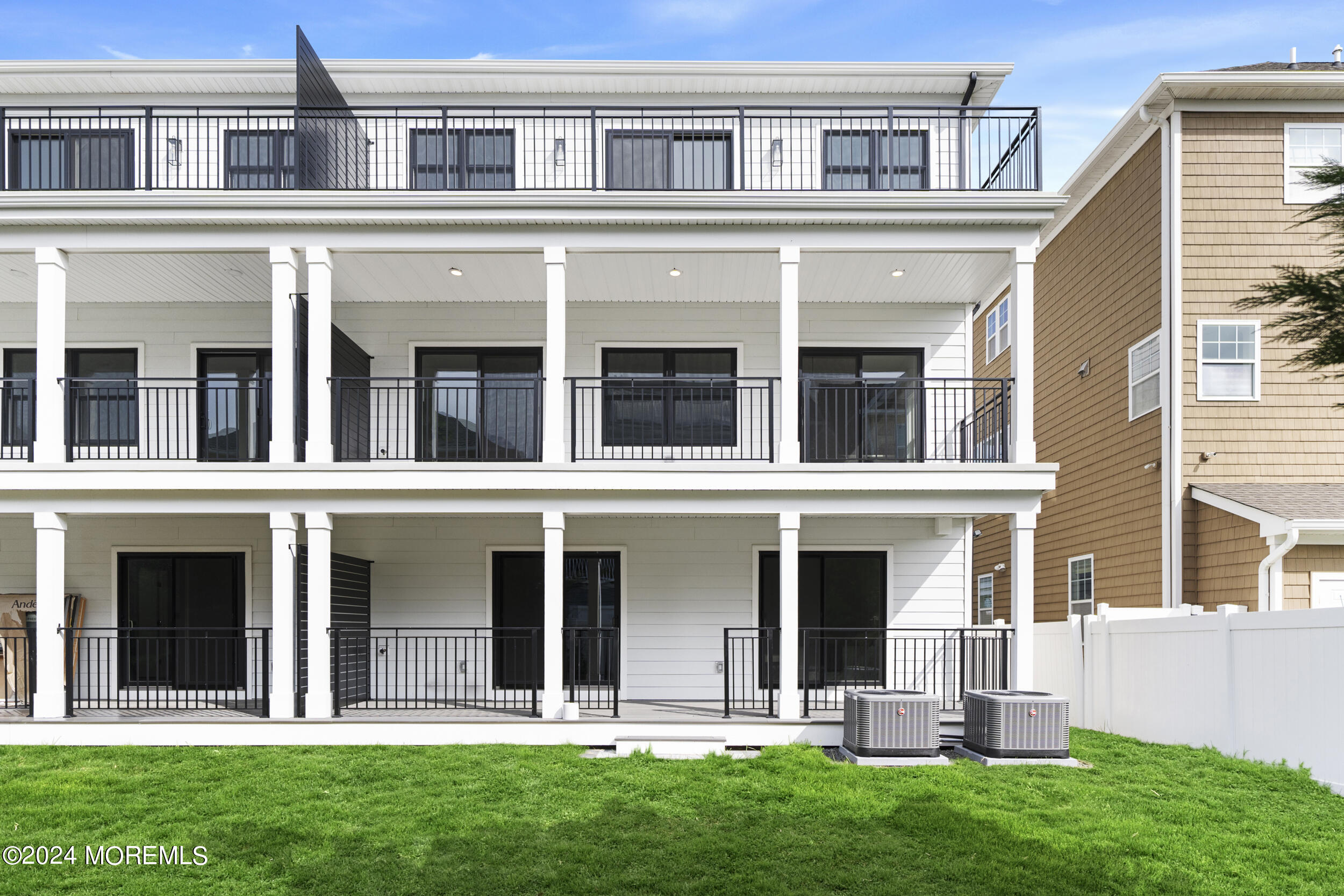 40 Seaview Avenue, Unit B Long Branch, NJ 07740 - Photo 77 of 81 front view of a brick house with a yard