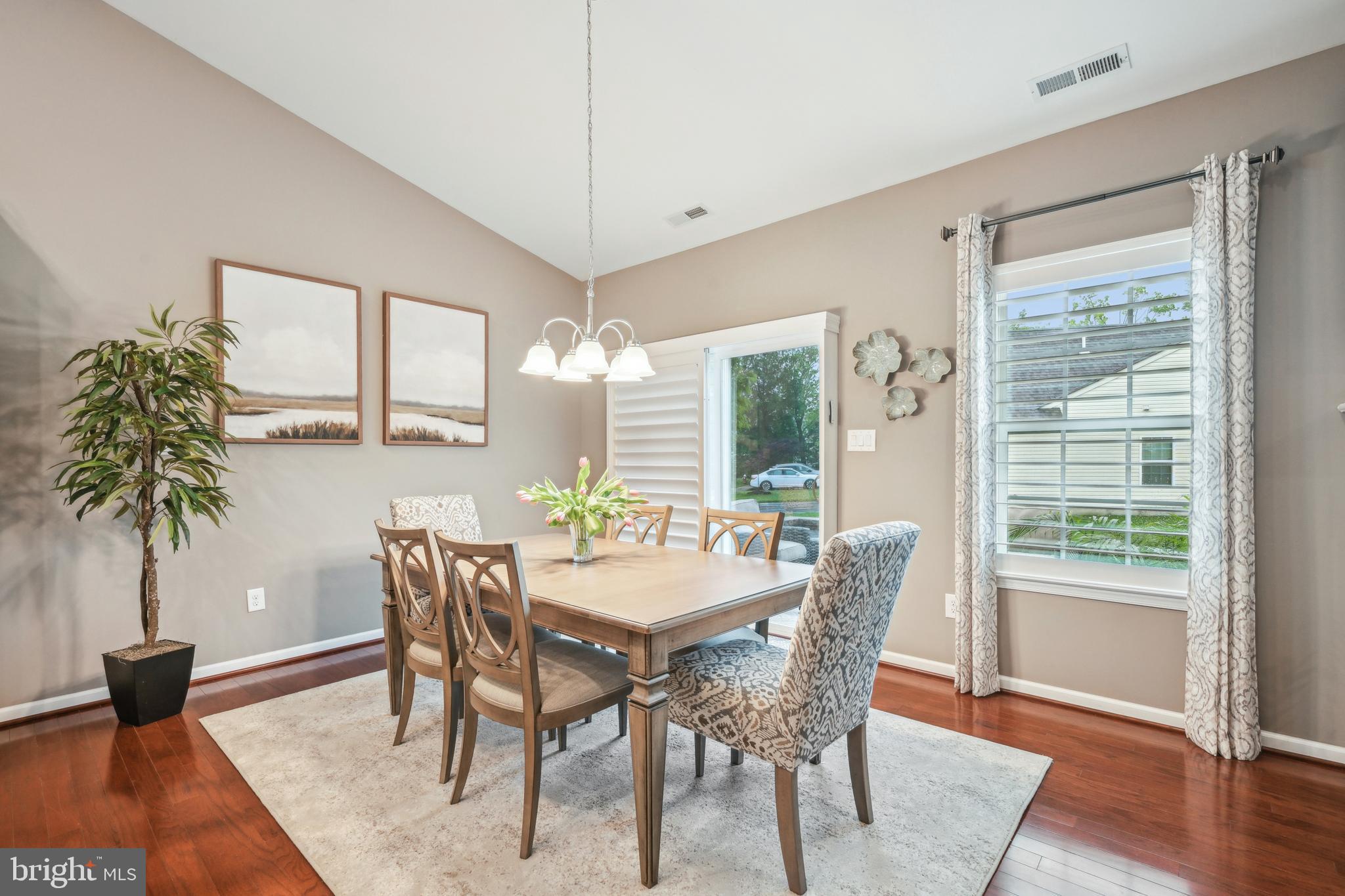 17 Alcott Way Marlton, NJ 08053 - Photo 12 of 43 a view of a dining room with furniture window and wooden floor