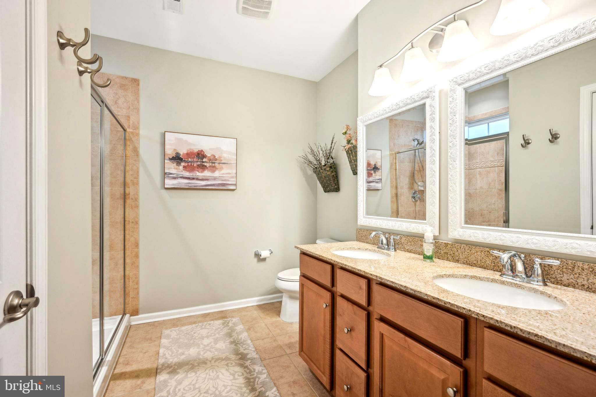 17 Alcott Way Marlton, NJ 08053 - Photo 31 of 43 a bathroom with a granite countertop sink mirror and a