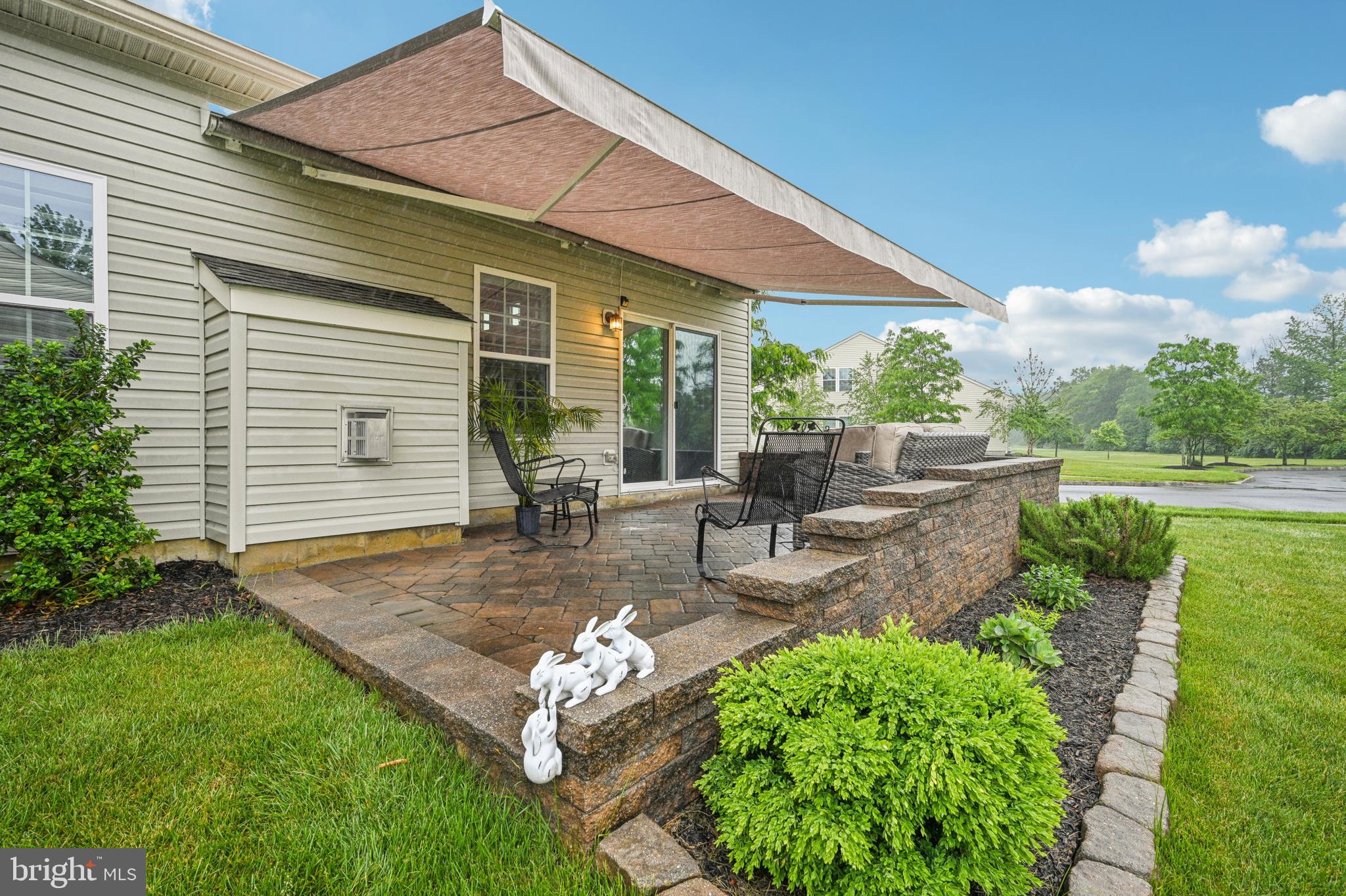 17 Alcott Way Marlton, NJ 08053 - Photo 36 of 43 a view of a backyard with plants and a patio