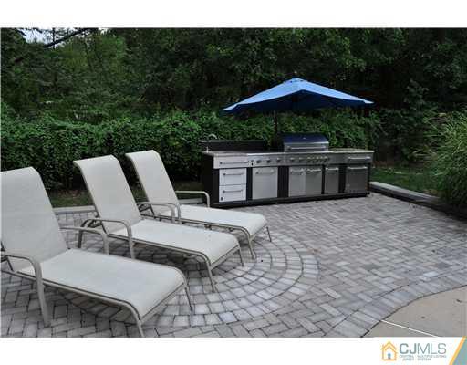 31 Smith Road Somerset, NJ 08873 - Photo 22 of 24 a view of yard with outdoor seating