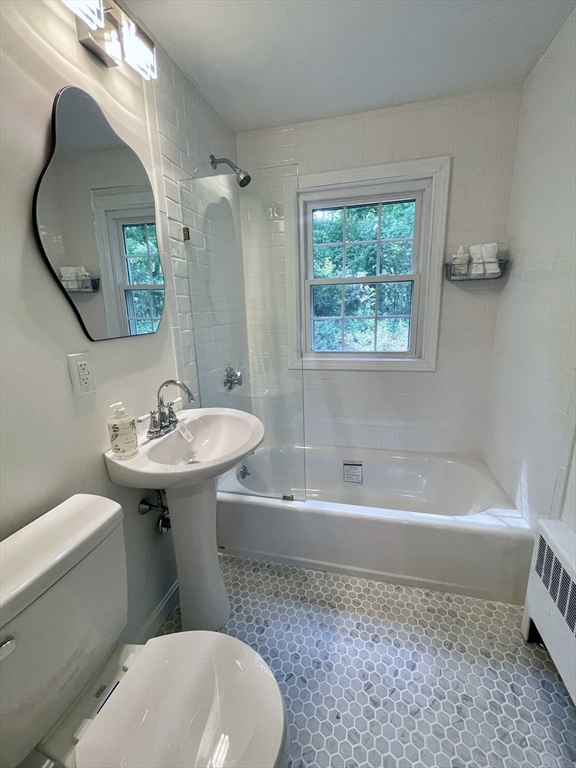 19 Robinwood Drive Canton, MA 02021 - Photo 11 of 12 a bathroom with a sink a toilet and bathtub