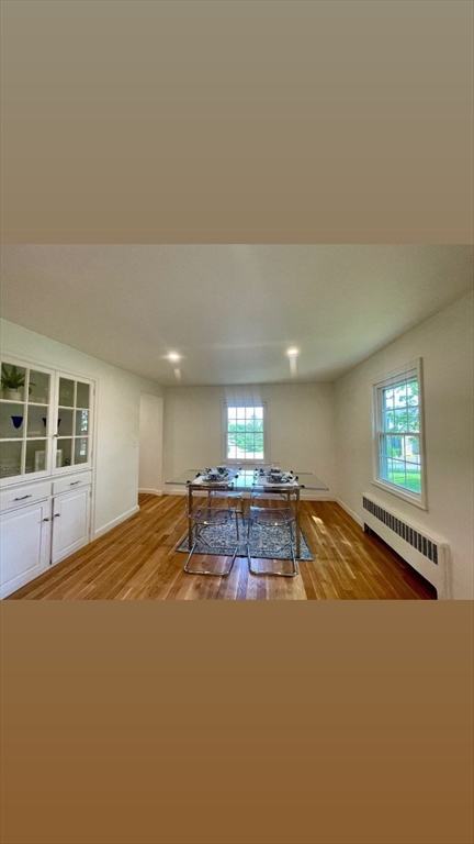 19 Robinwood Drive Canton, MA 02021 - Photo 5 of 12 a view of a livingroom with furniture and window