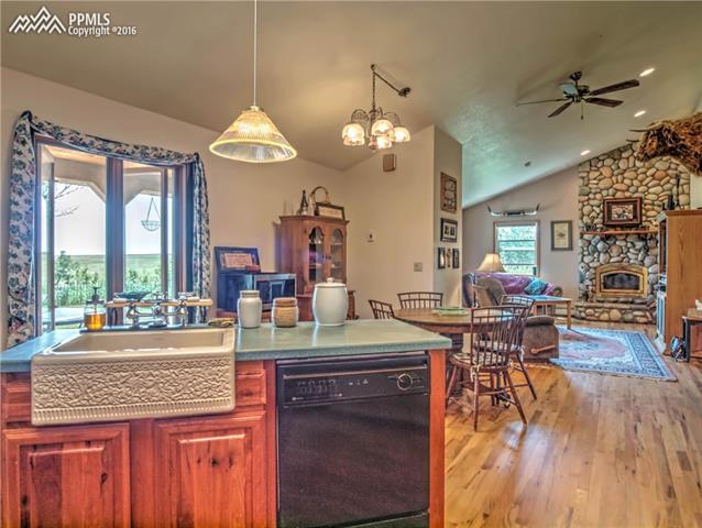 40550 Funk Road Ramah, CO 80832 - Photo 20 of 31 Love this sink!!! And how about that amazing rock fireplace?!