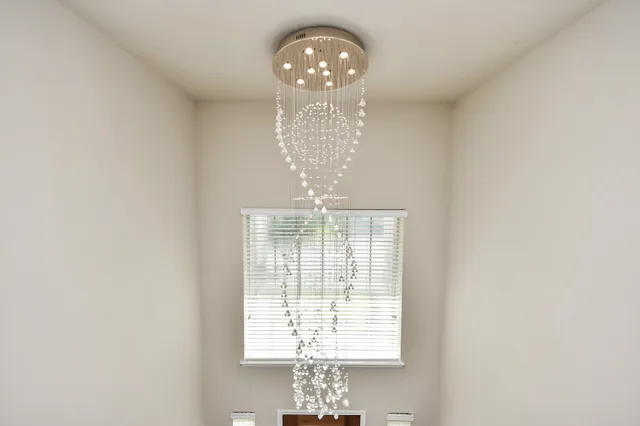 a view of a chandelier in a room