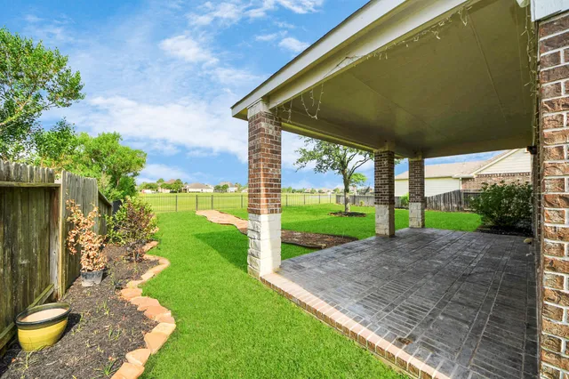 a view of a backyard with a garden