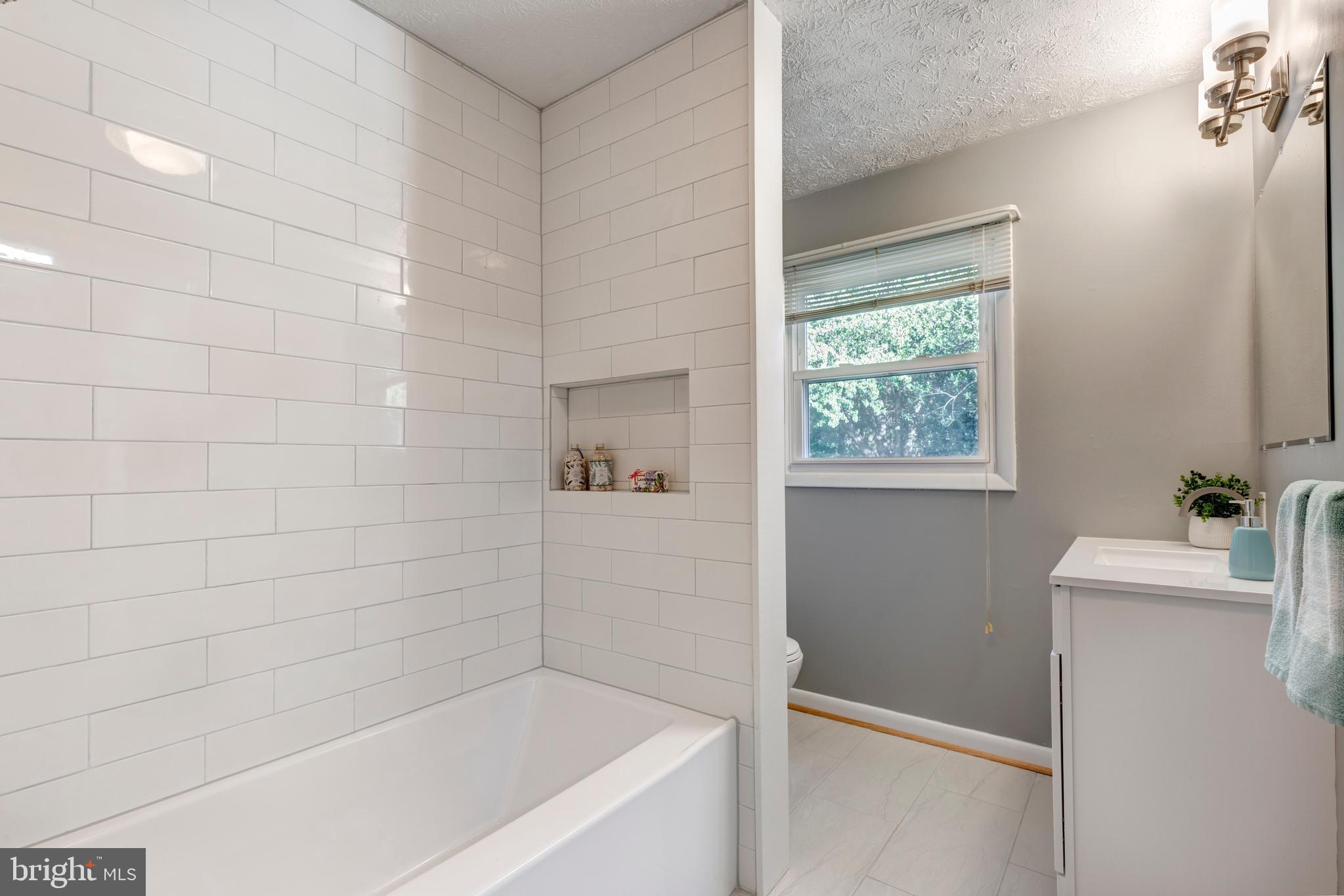 1202 Frizzell Road Westminster, MD 21157 - Photo 25 of 74 Ensuite Primary BA shower/tub subway tile surround