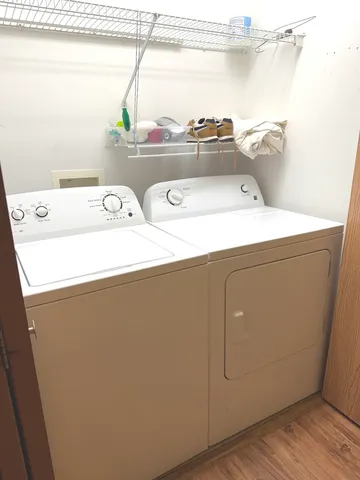 a utility room with dryer and washer
