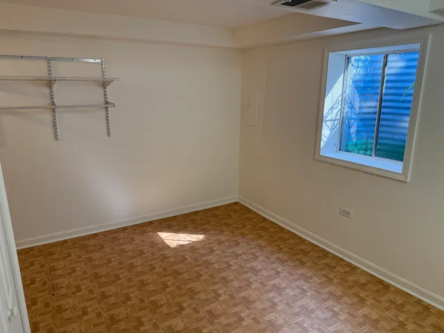 a view of empty room with windows