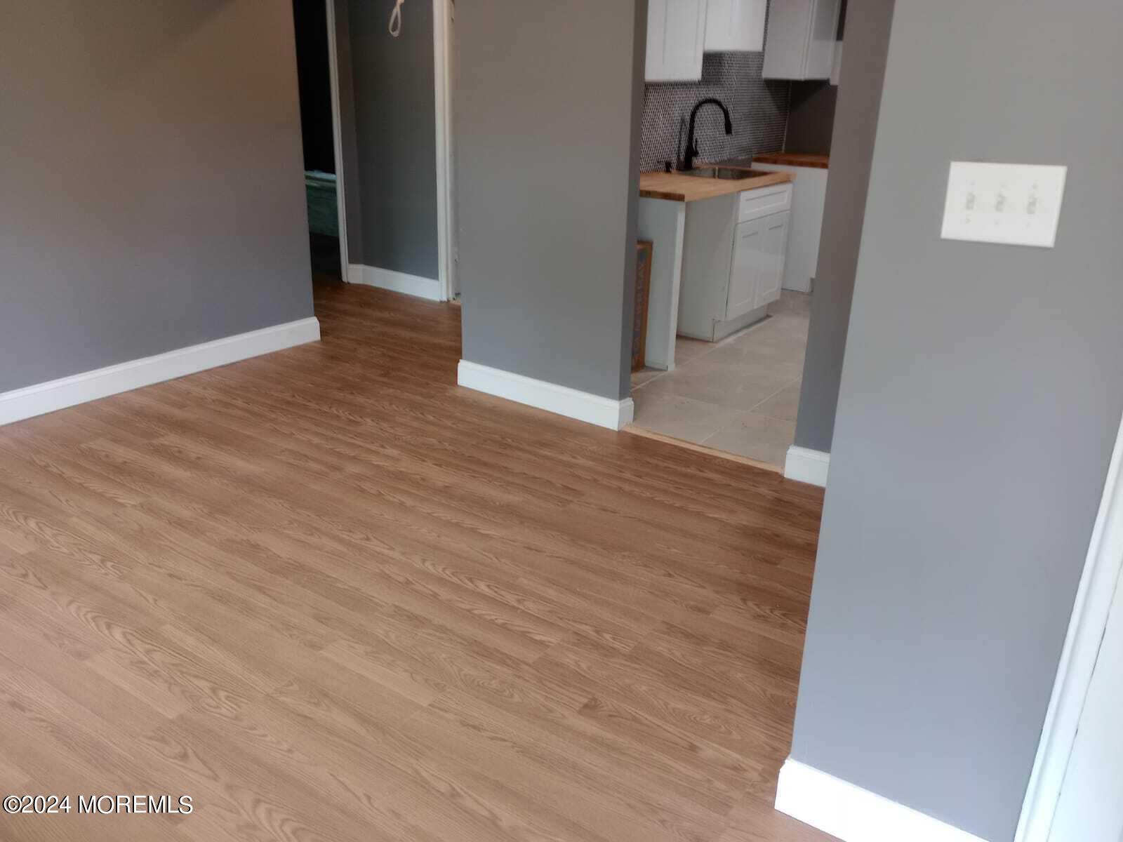 179 Kinsley Road Pemberton, NJ 08068 - Photo 2 of 9 a view of a storage and utility room with washer and dryer