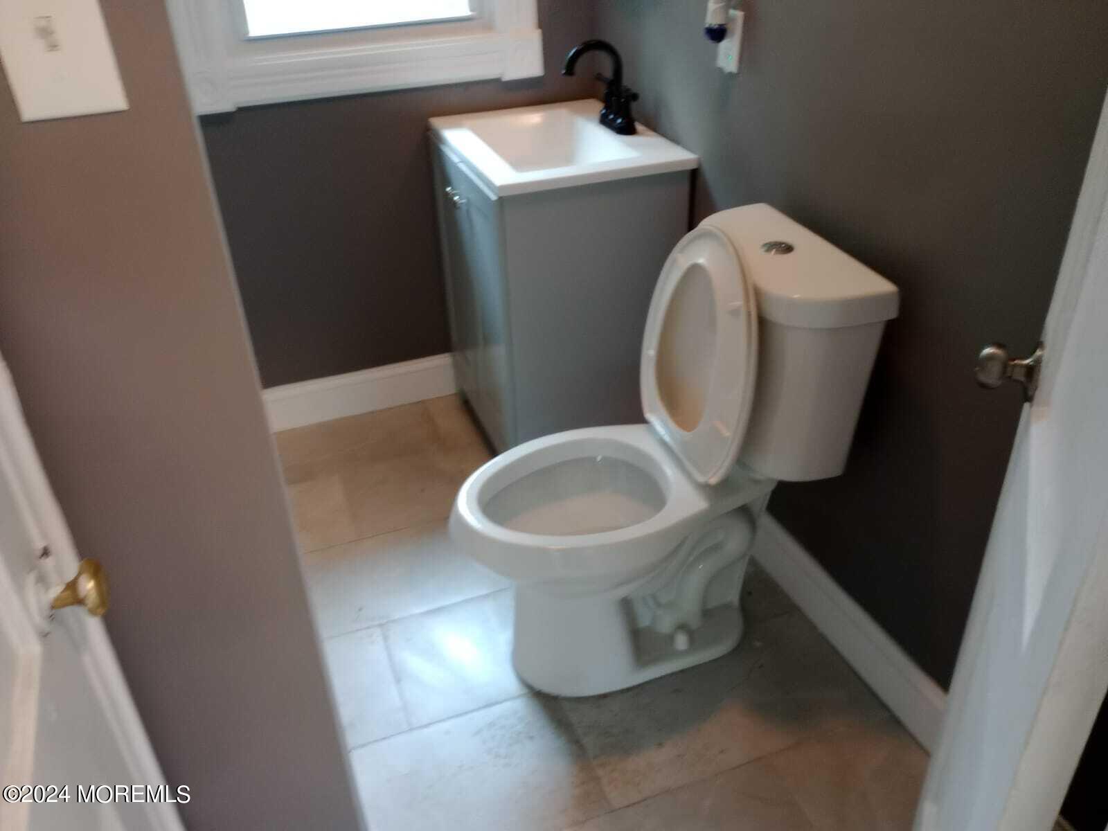 179 Kinsley Road Pemberton, NJ 08068 - Photo 6 of 9 a bathroom with a sink and toilet