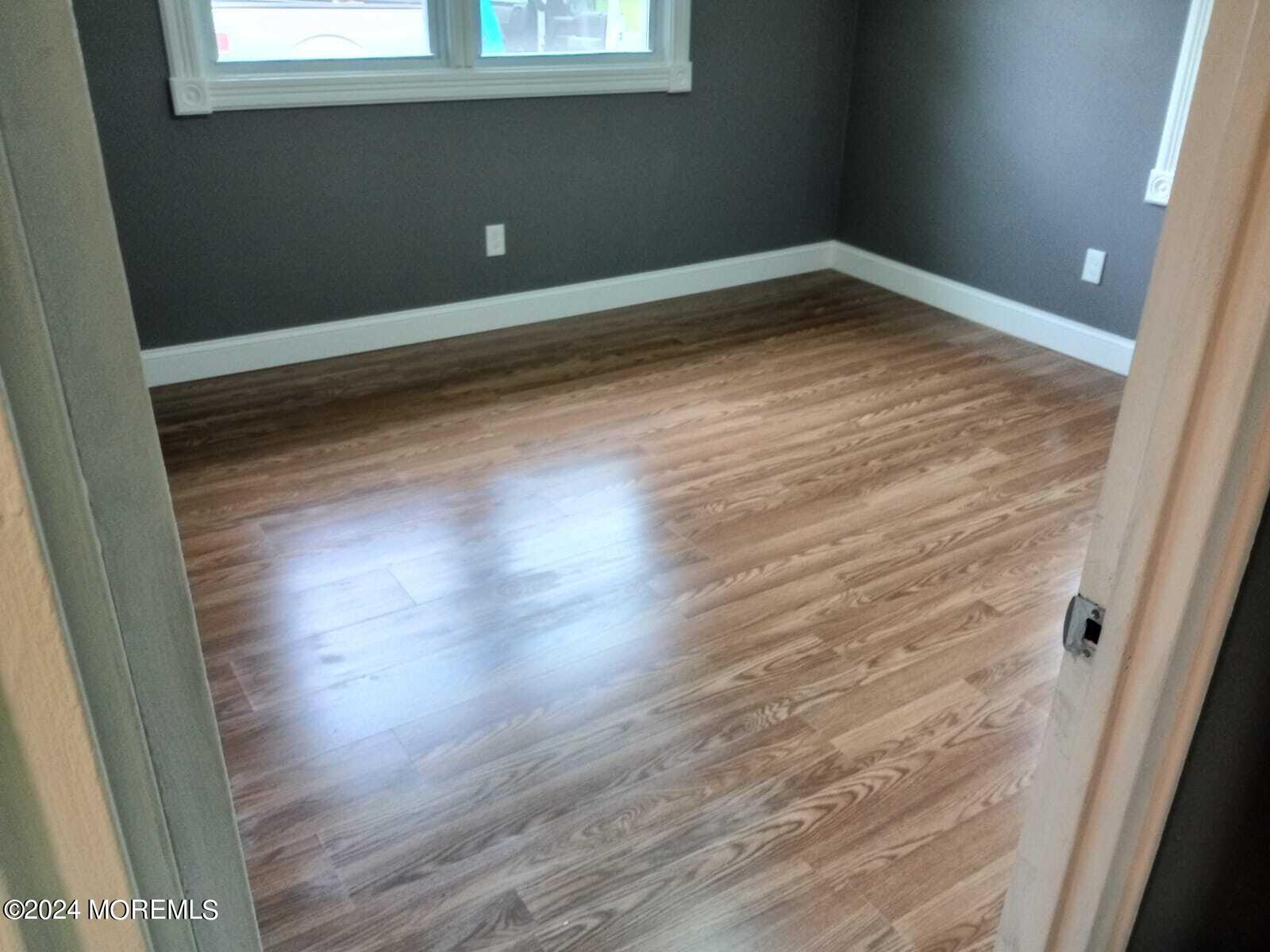 179 Kinsley Road Pemberton, NJ 08068 - Photo 9 of 9 a view of empty room with wooden floor