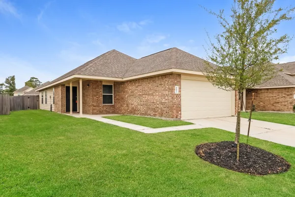a backyard of a house with lots of green space
