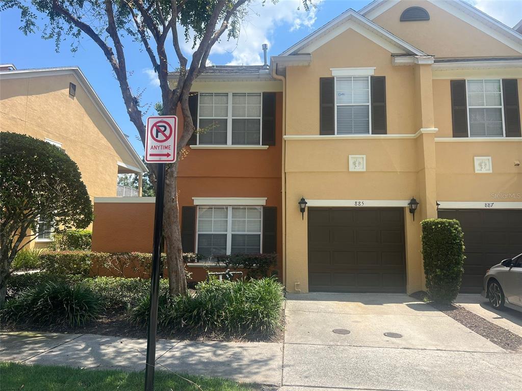 885 Assembly Court Reunion, FL 34747 - Photo 1 of 1 a sign that is on the side of a building