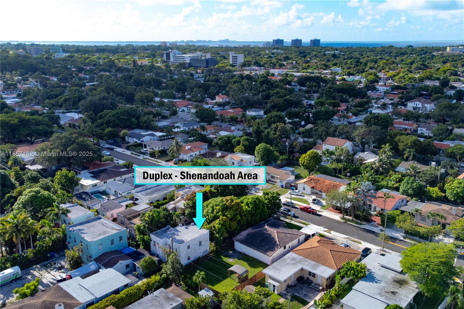 an aerial view of residential building and street