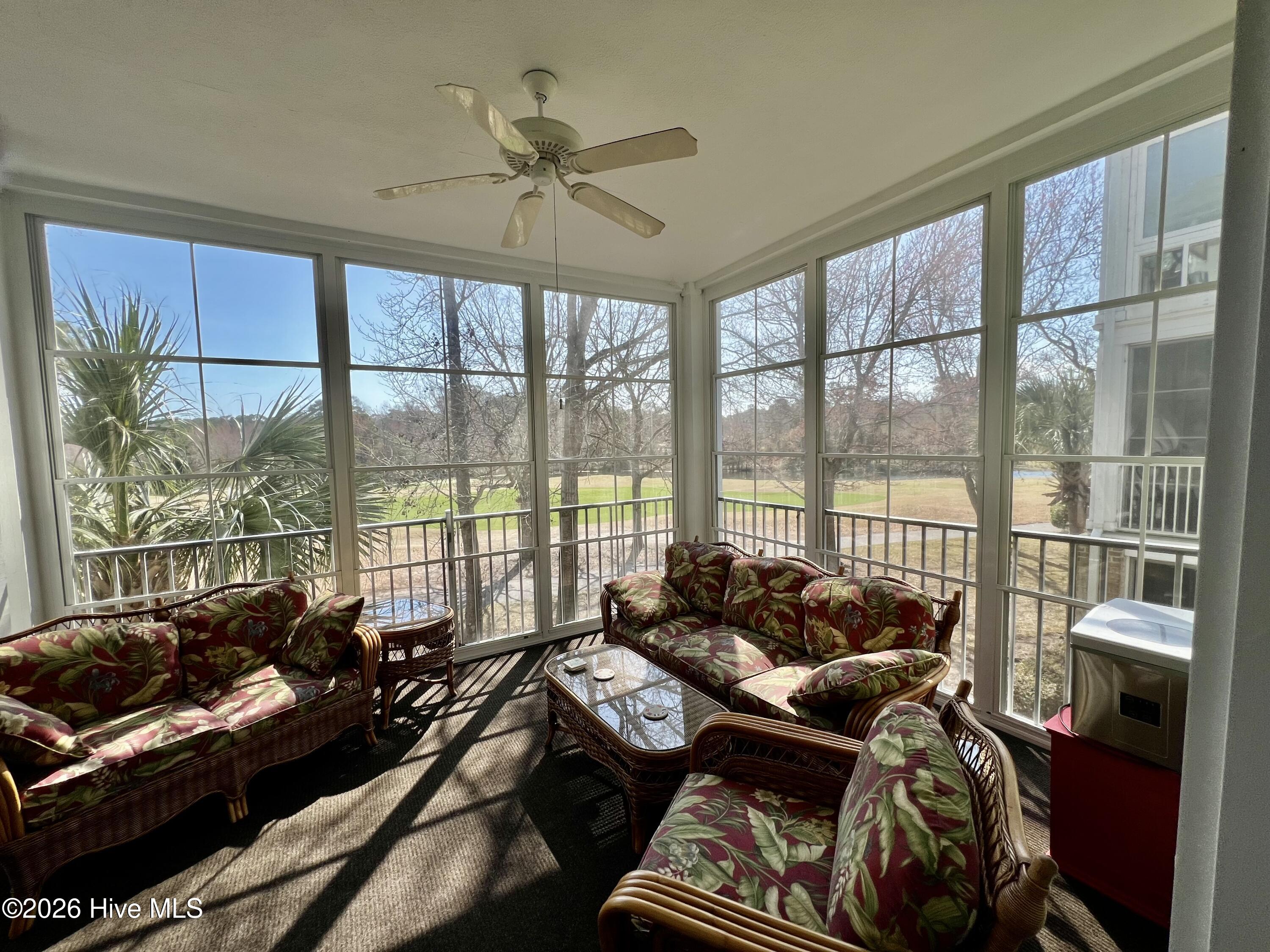 182 Clubhouse Road, Unit 4 Sunset Beach, NC 28468 - Photo 18 of 24 three season room1