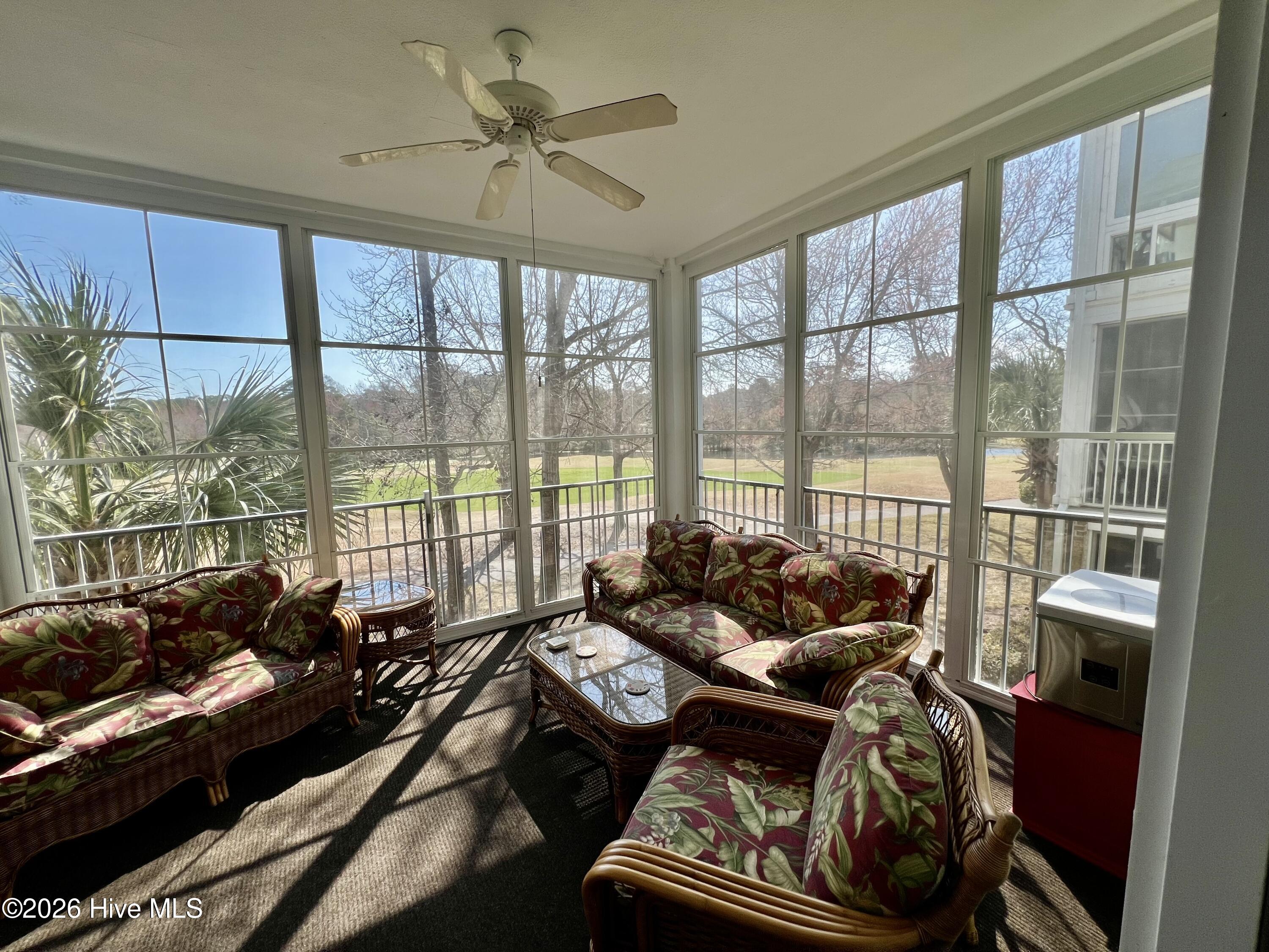 182 Clubhouse Road, Unit 4 Sunset Beach, NC 28468 - Photo 20 of 24 three season room3