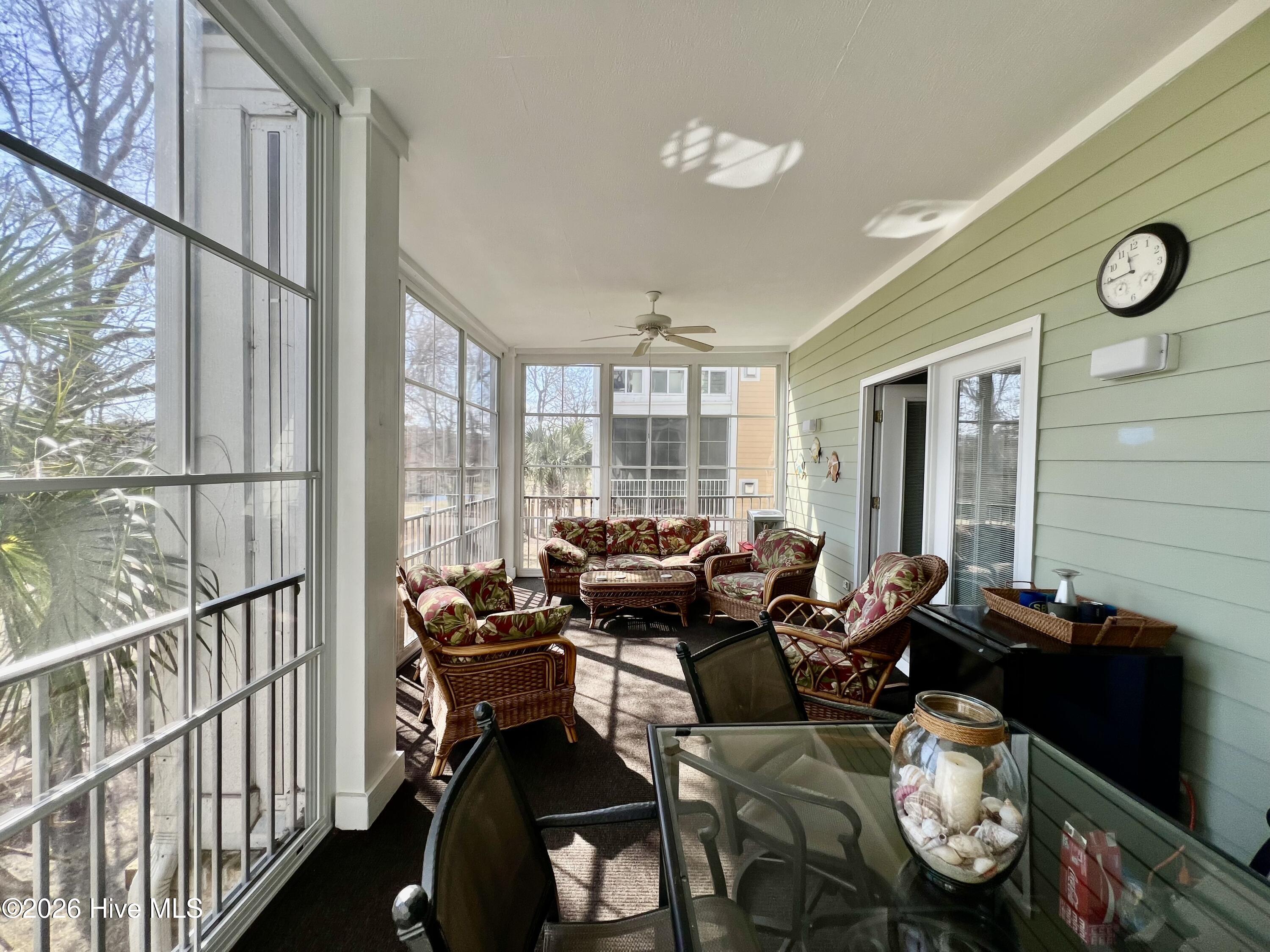 182 Clubhouse Road, Unit 4 Sunset Beach, NC 28468 - Photo 21 of 24 three season room4