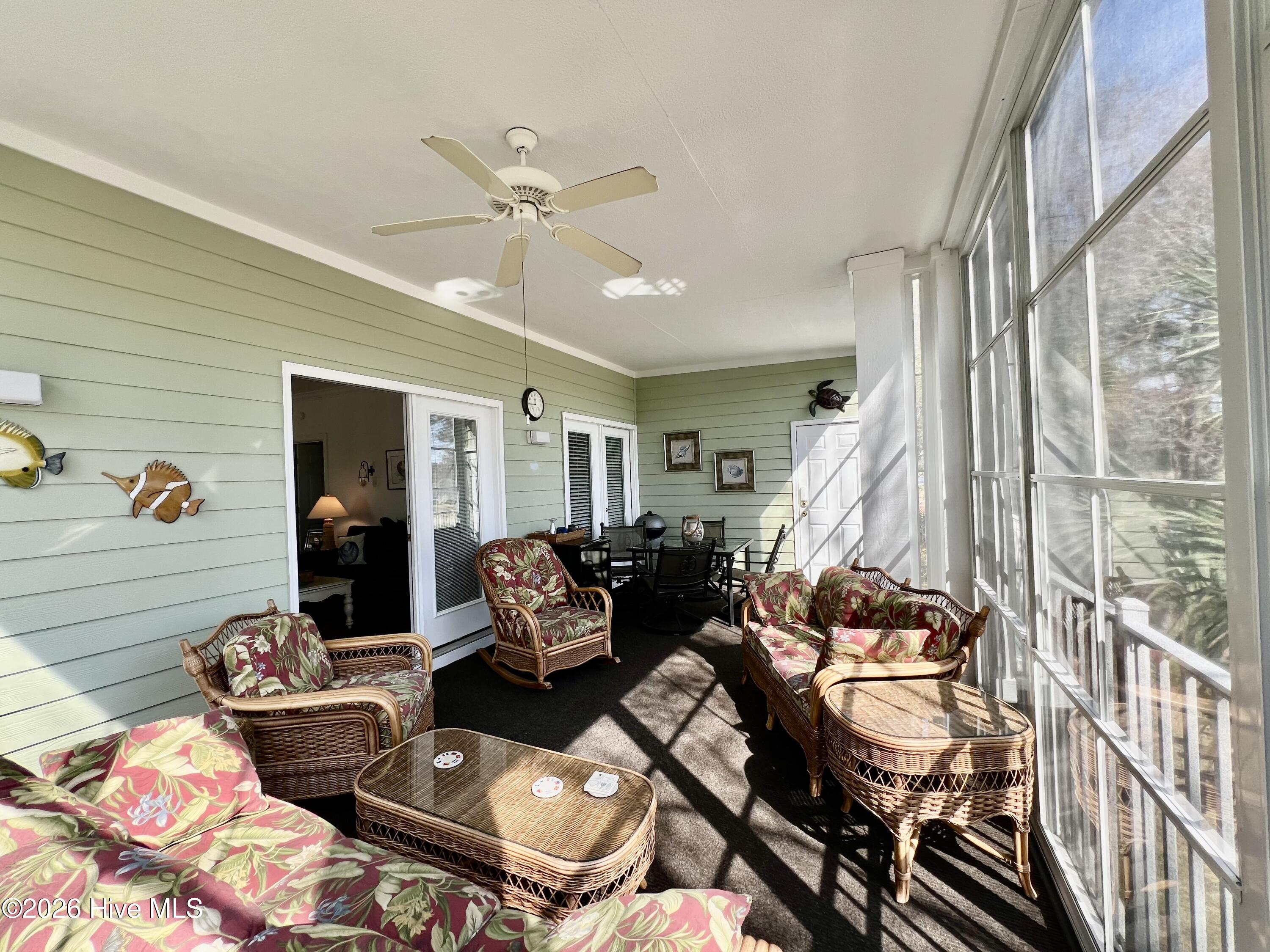 182 Clubhouse Road, Unit 4 Sunset Beach, NC 28468 - Photo 22 of 24 three season room5