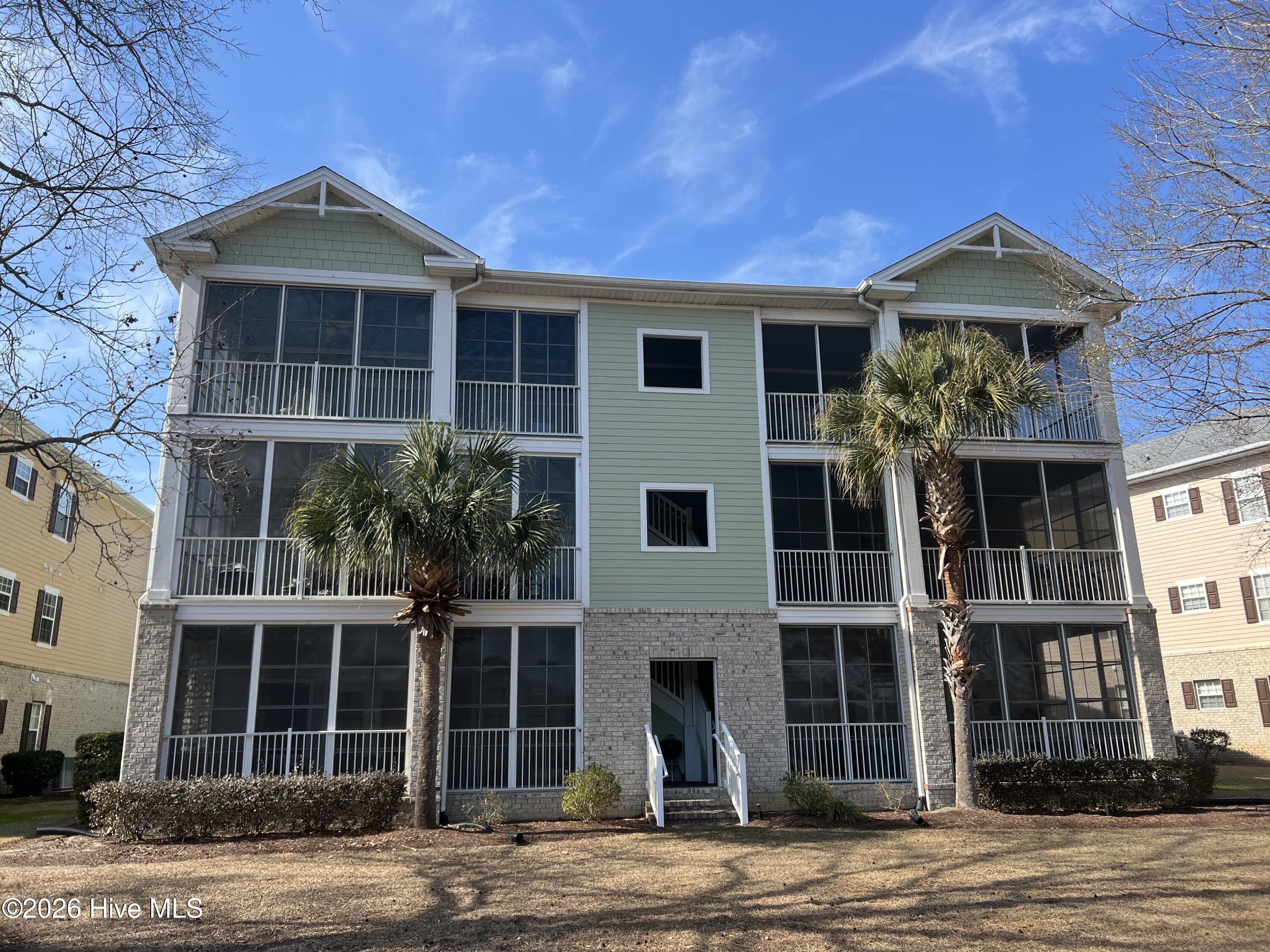 182 Clubhouse Road, Unit 4 Sunset Beach, NC 28468 - Photo 23 of 24 Back of building1