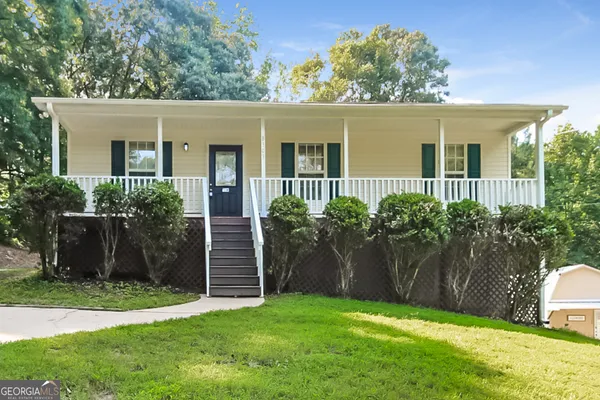 front view of a house with a yard